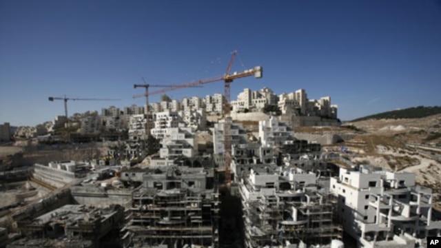 Houses under construction in a Jewish settlement near Jerusalem known to Israelis as Har Homa and to Palestinians as Jabal Abu Ghneim, 08 Dec 2010