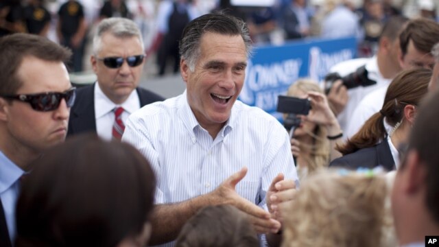 Republican presidential candidate and former Massachusetts Gov. Mitt Romney shakes hands during a campaign event in Hobbs, New Mexico, Aug. 23, 2012.
