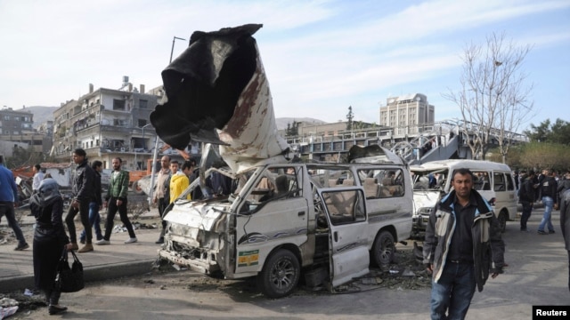 A general view of the destruction after an explosion in central Damascus, Feb. 21, 2013.