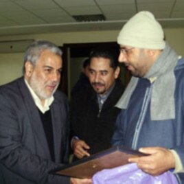 Abdelilah Benkirane (L), the new Head of Government, with two PJD delegates from Agadir (file photo).