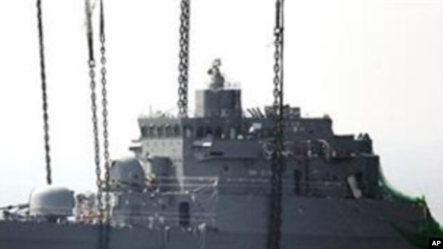 In this April 24, 2010 file photo, a giant offshore crane salvages the bow section of the South Korean naval ship Cheonan