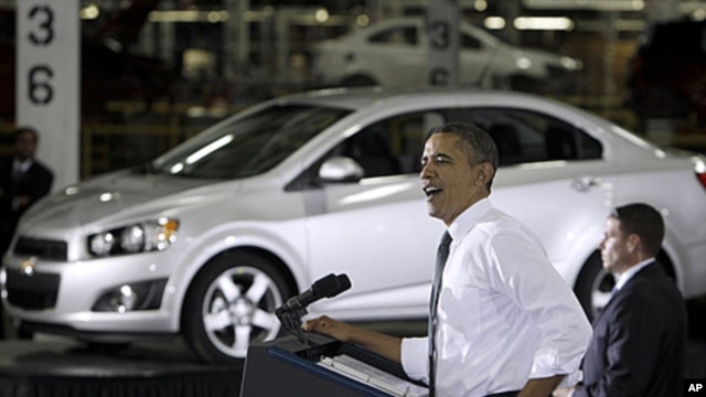 President Barack Obama speaks at the General Motors Orion assembly plant in Orion Township, Michigan, October 14, 2011.