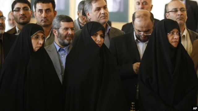 Marzieh Vahid Dastgerdi, center, is seen during a press conference when she was nominated as health minister by Iranian President Mahmoud Ahmadinejad in 2009.