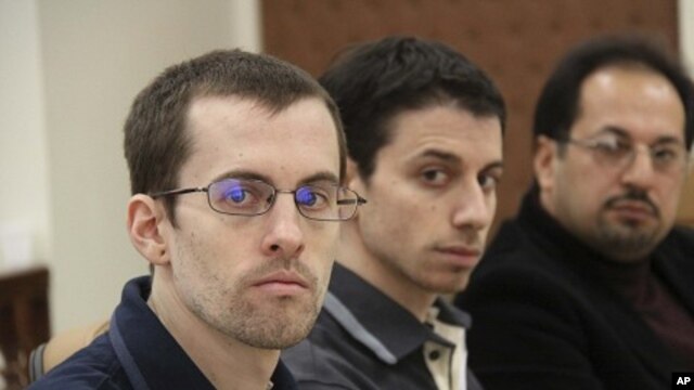 American hikers Shane Bauer (L) and Josh Fattal and their translator attend the first session of their trial in Tehran  (file photo)