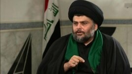 Shi'ite cleric Moqtada al-Sadr speaks with the Alhurra television network. 