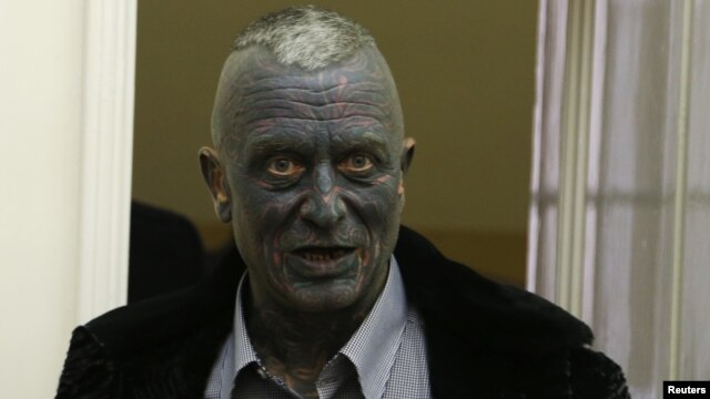 Candidate Vladimir Franz arrives to cast his vote for the presidential elections at a polling station in Prague, Jan. 11, 2013.