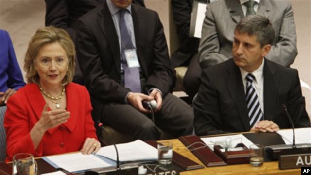 US Secretary of State Hillary Rodham Clinton addresses a UN Security Council meeting on women; Austria's Foreign Minister Michael Spindelegger is on the right, 26 October 2010