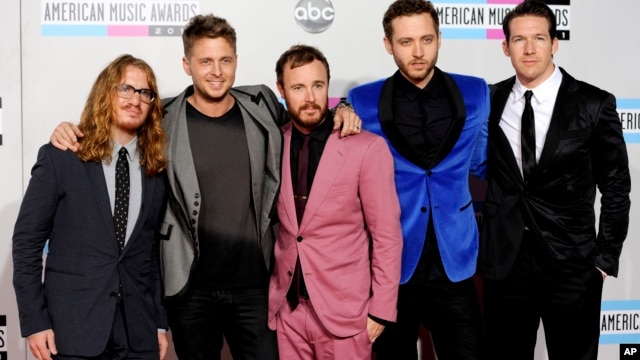 FILE - OneRepublic arrives at the 39th Annual American Music Awards in Los Angeles. 
