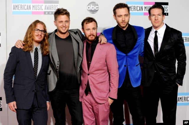FILE - OneRepublic arrives at the 39th Annual American Music Awards in Los Angeles.