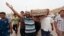 Relatives carry the coffin of an Iraqi police officer killed by militants during a funeral in Najaf, May 20, 2013.