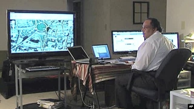 Omar Afifi Suleiman directs Egyptian demonstrations from his high tech command center near Washington, D.C.
