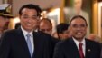 Chinese Premier Li Keqiang (L) and Pakistani President Asif Ali Zardari (R) leave after a signing of agreements ceremony at the presidential palace in Islamabad on May 22, 2013.