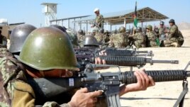 Inside a sprawling desert-like compound on the outskirts of Kabul, some 11,000 soldiers, non-commissioned officers and officers are training to join the Afghan army, November 2012. (Sharon Behn/VOA)