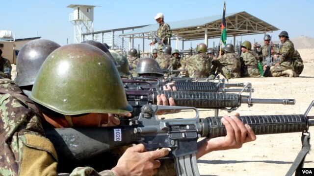 Inside a sprawling desert-like compound on the outskirts of Kabul, some 11,000 soldiers, non-commissioned officers and officers are training to join the Afghan army, November 2012. (Sharon Behn/VOA)