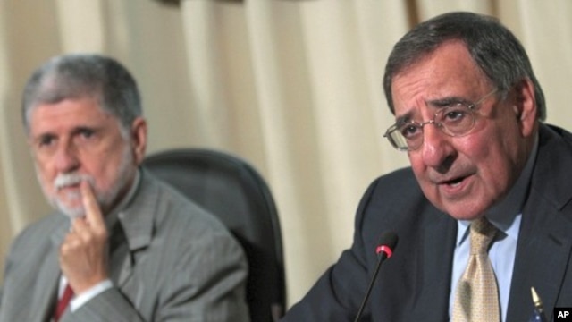 U.S. Defense Secretary Leon Panetta, right, and Brazil’s Defense Minister Celso Amorim attend a joint press conference in Brasilia, Brazil, April 24, 2012. 