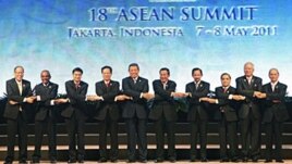 Heads of states and governments of the Association of Southeast Asia Nations pose for a group shot during the opening ceremony of the 18th ASEAN Summit in Jakarta, Indonesia, May 7, 2011.