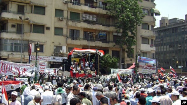 Protesters gather in front of a stage in Tahrir Square, July 15, 2011