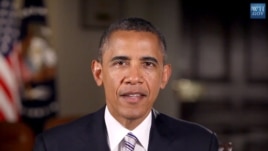 President Barack Obama is seen delivering his weekly address (White House video screen grab).