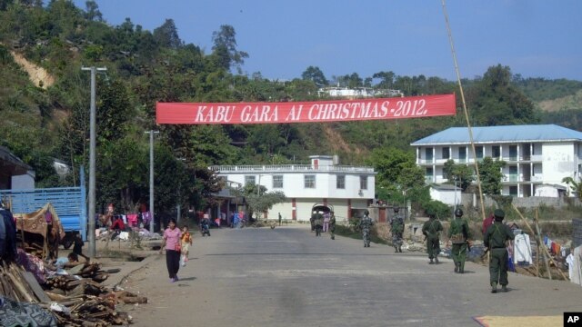 Soldiers of the ethnic Kachin Independence Army (KIA) patrol in downtown Laiza, northeastern Burma, January 4, 2013. 