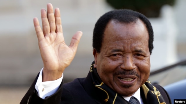 FILE - Cameroon's President Paul Biya departing a meeting at the Elysee Palace in Paris.