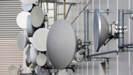 Various types of directional antennas are pictured on the roof of a skyscraper in Berlin, November 5, 2013. Germany's Foreign Ministry said on Tuesday it had asked the British ambassador to come and discuss a report that Britain was operating a covert spy