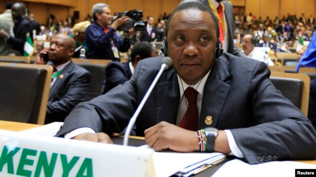 Kenya's President Uhuru Kenyatta attends the opening ceremony of the 22nd Ordinary Session of the African Union summit in Addis Ababa, Jan. 30, 2014. 