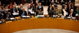 Members of the United Nations Security Council vote to tighten sanctions on North Korea in New York, Mar. 7, 2013.