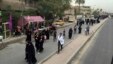 Shi'ite pilgrims march toward the Imam Mousa al-Kadhim shrine to commemorate the anniversary of the Imam's death in Baghdad, Iraq, April 29, 2016. 