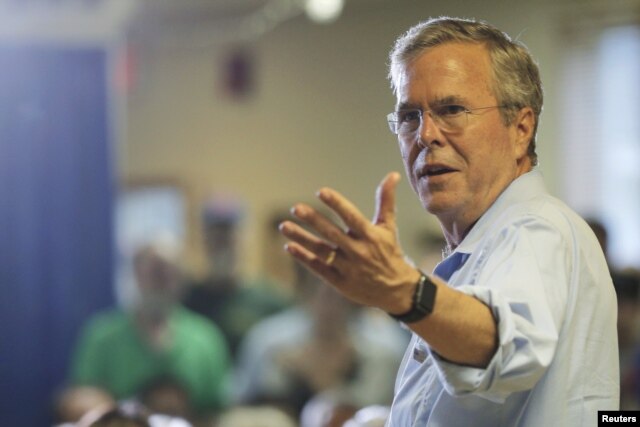 FILE - Republican presidential candidate Jeb Bush answers a question from the audience during a town hall campaign stop at the VFW Post in Hudson, New Hampshire, July 8, 2015.