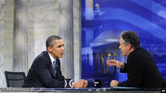 President Barack Obama talks with host Jon Stewart as he takes part in a taping of Comedy Central's The Daily Show with Jon Stewart, 27 Oct 2010, in Washington