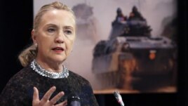 U.S. Secretary of State Hillary Clinton addresses a news conference during a NATO foreign ministers meeting in Brussels, Belgium, December 5, 2012. 