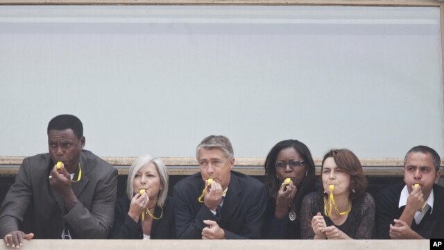 Carl Lewis blowing the whistle on hunger in Rome to launch the UN's 1 Billion Hungry Project.