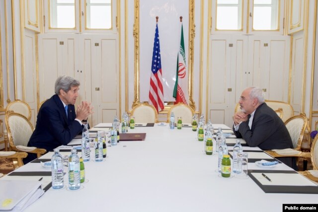 U.S. Secretary of State John Kerry sits across from Iranian Foreign Minister Javad Zarif on June 30, 2015, in Vienna, Austria, before a one-on-one meeting amid negotiations about the future of Iran's nuclear program. (Photo: State Department)