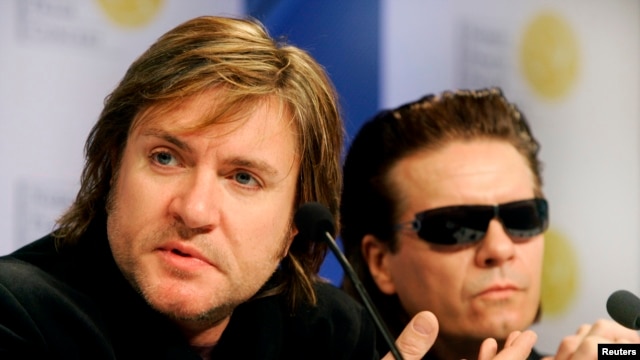 FILE - British band Duran Duran's Simon Le Bon (L) and Andy Taylor attend a news conference.