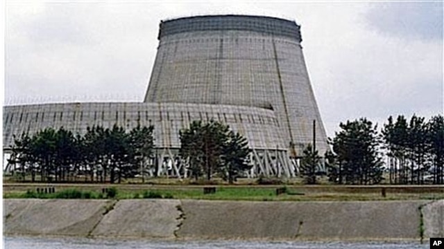 Reactor No. 4 of the Chernobyl nuclear power plant stands encased in lead and concrete following the April 1986 accident, which released a cloud of radiation that circled the world in Pripyat, 1988 (file photo)