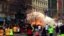 In this image from video provided by WBZ TV, spectators and runners run from what was described as twin explosions that shook the finish line of the Boston Marathon, April 15, 2013.  