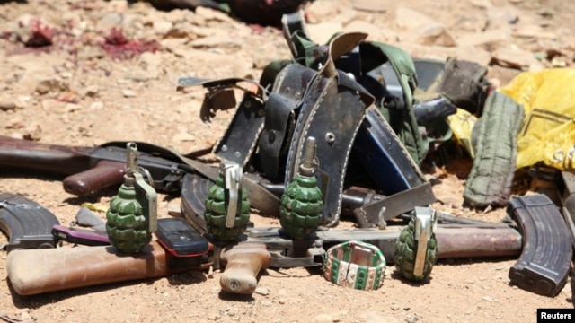 Ammunition used by suspected al Shabaab assailants killed during an attack is displayed outside Somalia's regional government headquarters in the central city of Baidoa, March 12, 2015.