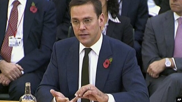 News Corp. executive James Murdoch speaks during his second appearance before British parliamentarians investigating the country's phone hacking scandal in London, November 10, 2011.