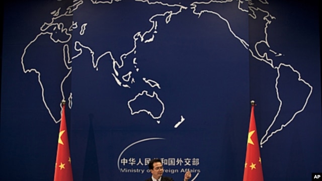 Chinese Foreign Ministry spokesman Hong Lei gestures during a news briefing at the Ministry of Foreign Affairs in Beijing, China. China, the world's most prolific executioner, put a Filipino man convicted of drug trafficking to death despite a clemency ap