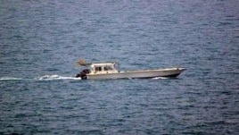A photo provided by the U.S. Navy shows a small vessel that was fired upon by the U.S. Navy off Dubai's coast on Monday, July 16, 2012. 