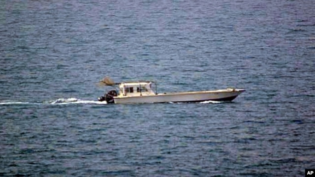 A photo provided by the U.S. Navy shows a small vessel that was fired upon by the U.S. Navy off Dubai's coast on Monday, July 16, 2012. 