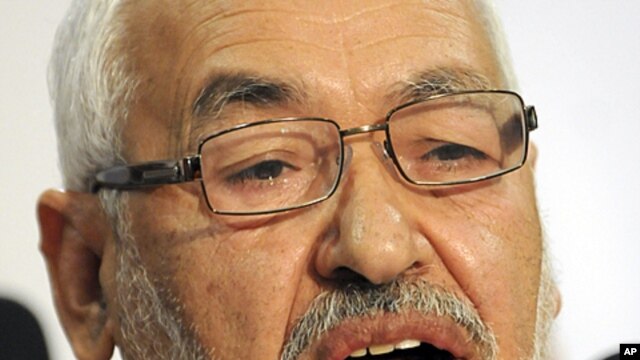 The leader and founder of the moderate Islamic party Ennahda, Rachid Ghannouchi, addresses the media during a press conference held in Tunis, October 28, 2011.