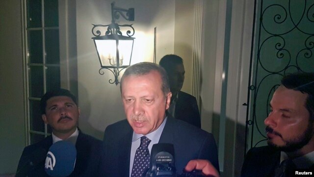 Turkish President Tayyip Erdogan speaks to media after a coup attempt, in the resort town of Marmaris, Turkey, July 15, 2016.