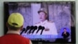 A South Korean man watches a TV news reporting about North Korean leader Kim Jong Un's special envoy Choe Ryong Hae, at a Seoul Train Station in Seoul, South Korea, May 22, 2013.