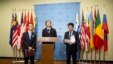 Motohide Yoshikawa, left, Japan's ambassador to the United Nations, and South Korea's Ambassador Oh Joon, right, listen as Samantha Power, center, the U.S. ambassador, makes comments to the media following a Security Council meeting at U.N. headquarters, Sunday, Feb. 7, 2016.