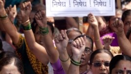 Activist of Hindu Janajagruti Samiti, or Hindu Awareness Forum, shout slogans against  the government's attempts to block social media accounts and websites, August 24, 2012.