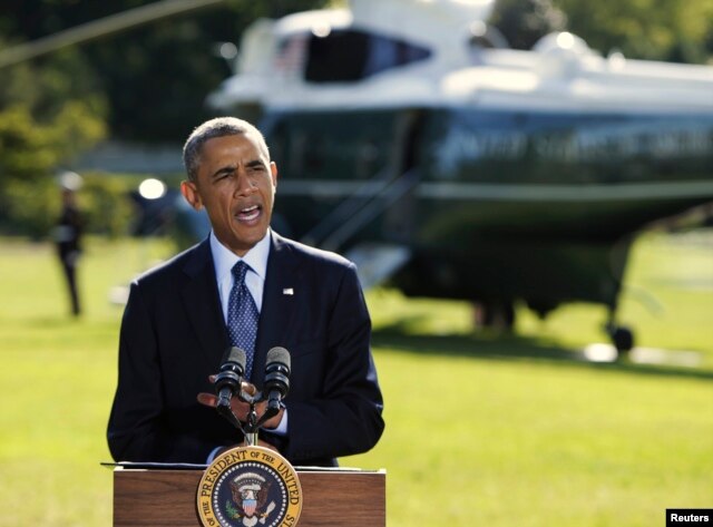 FILE - President Barack Obama delivers a statement at the White House in Washington on airstrikes in Syria, prior to departing for the United Nations in New York, Sept. 23, 2014.