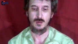 Hoton jami'in leken asirin dan kasar Faransa, Dennis Allex wanda al-Shabaab tace ta kashe. Oktoba. 4, 2012 
