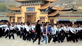 Thousands of Tibetan students stage protests in Rebkong, northwestern China's Qinghai province, 19 Oct 2010