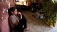 An internally displaced Yazidi who fled from an Iraqi town after advances by Islamic militants takes shelter at a school in Dahuk, 260 miles (420 kilometers) northwest of Baghdad, Thursday, Oct. 2, 2014. 